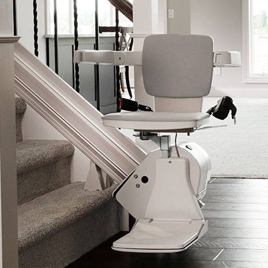 Stairlift installed on a residential staircase